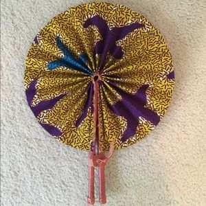 Beautiful leather and cloth fan.